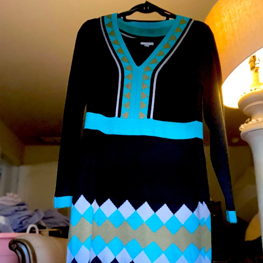 Dress Details:
V-Neck
Long Sleeves
Angora Look Alike
Soft